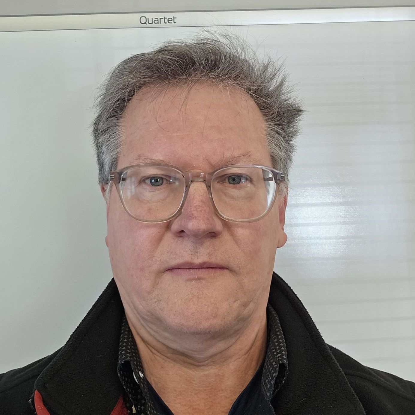 Profile of John Komer