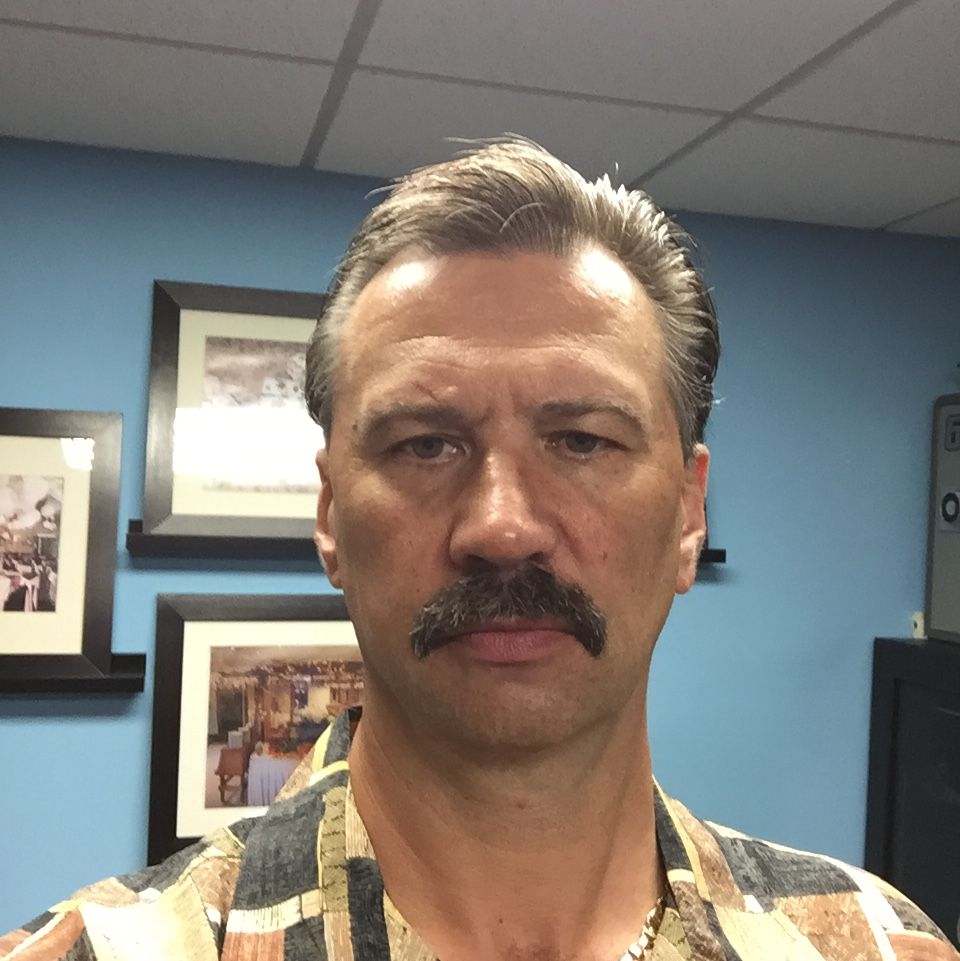 Profile of Mark Kuszczak