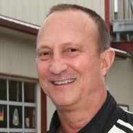 Profile of Dana Comolli