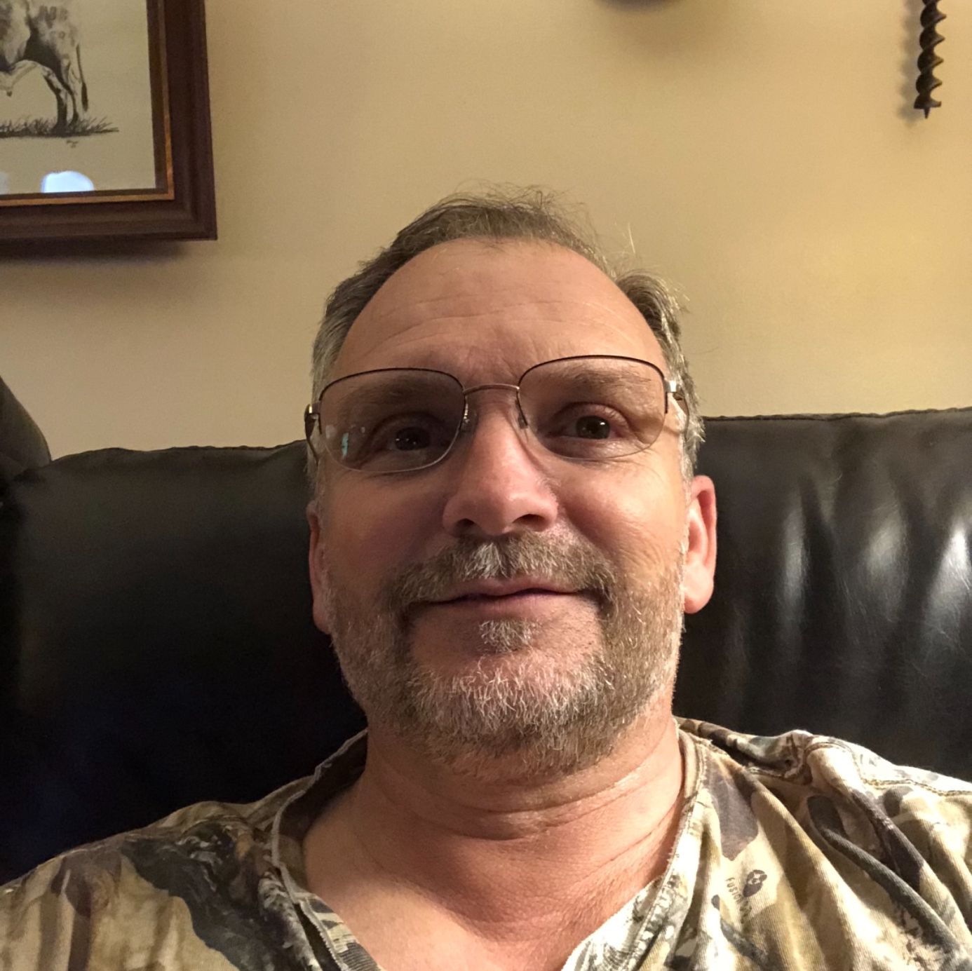 Profile of John (Chuck) Mitchell