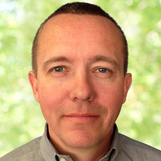 Profile of Greg Scandrett
