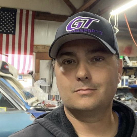 Profile of Greg Tholen