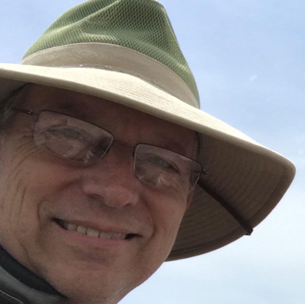 Profile of John M Holmes